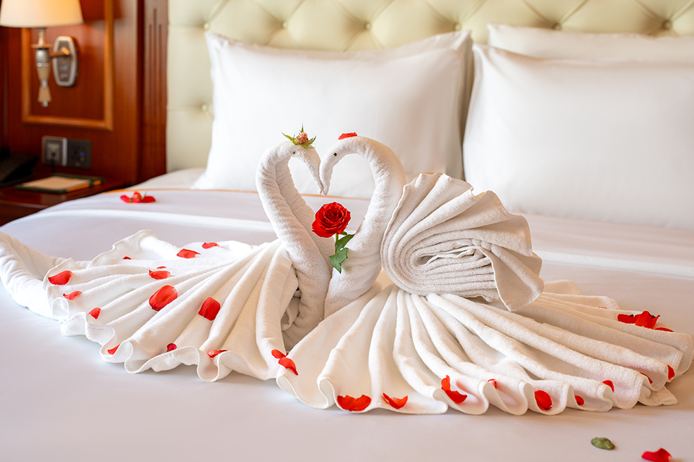 Towel art and flower petal decoration at DLG Hotel Danang
